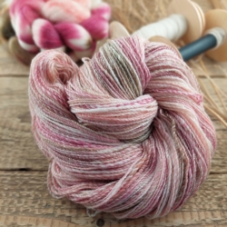 Hand spun merino wool silk yarn Woolento white pink