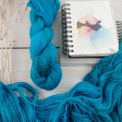 hand dyed speckled sock knitting yarn Woolento turquoise Jules